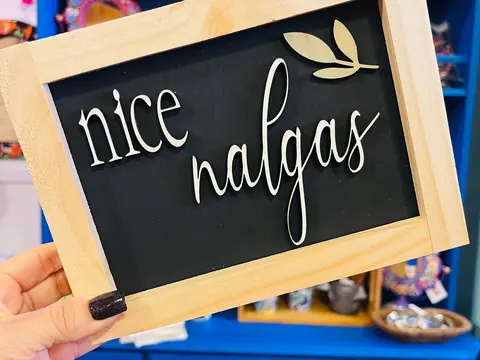 Handmade framed wood sign with playful hand lettering